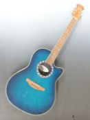Applause Ovation composite bodied Electroacoustic guitar model No. AE28 with round back, with padded