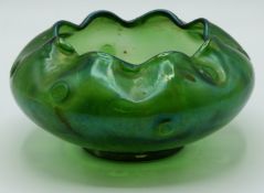 Loetz/ Kralik iridescent glass bowl with wavy rim and dimple decoration, 18cm in diameter.