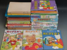 Thirty-six various Rupert annuals and books dating from 1937 onward.