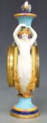 Wedgwood majolica 19thC pedestal figural clock decorated with two mermaids and swags and with bird
