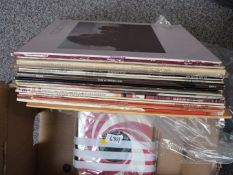 Eighteen albums, 1 twelve inch single and 12 singles including The Last Waltz, Eric Clapton, David