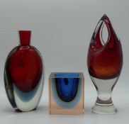 Three Murano Sommerso glass vases comprising a cube vase with original label, a bottle vase and
