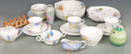 A collection of Shelley porcelain including trios, cake plates, pedestal bowl, toast rack, mustard