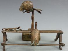 An Eastern Ashanti style desk pen stand with inkwell with animal decoration and engraved well, 18.