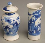 Two Chinese blue and white vases with figural decoration, largest 12cm tall.