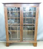 Georgian mahogany glazed display cabinet raised on bracket feet, W131 x D37 x H173cm