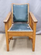 Arts and Crafts oak upholstered adjustable arm or steamer chair