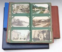Four postcard albums including Edwardian coastal scenes, Stockport, small album of reproduction nude