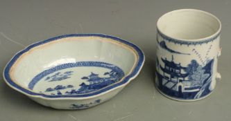 Two Chinese blue and white items, both with landscape decoration comprising a tankard (H15cm) and