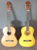 Two acoustic guitars fitted with nylon strings, one unlabelled in high gloss lacquered finish, the