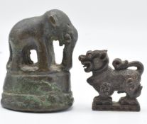 A 19thC Chinese finely cast miniature bronze Dog of Fo figure 2.1cm and a bronze elephant on