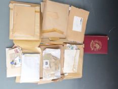 A large quantity of loose GB stamps on paper and a quantity of loose stamps in packets