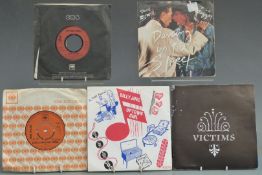 Approximately 200 singles, mostly 1970s and 1980s