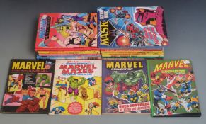 Twenty-one super hero annuals including Mysteries of the Unexplained, Mighty World of Marvel,