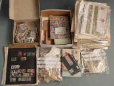 A large quantity of loose album pages and loose stamps, all-world with many early issues.