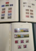 Collections of Great Britain (3), Jersey, Guernsey and Isle of Man stamps, mint and used, in