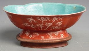 19thC Chinese porcelain dish with white floral decoration on burnt orange ground and turquoise