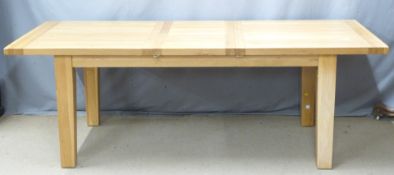 Contemporary light oak extendable dining table and eight faux leather chairs, L180 or 230 extended x