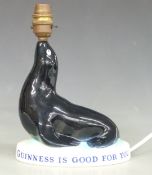 An original Carltonware Guinness seal advertising lamp Guinness is Good for You, H24cm