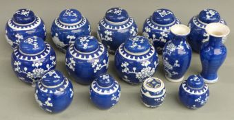 Fourteen items of Chinese blue and white porcelain comprising eleven prunus flower ginger jars