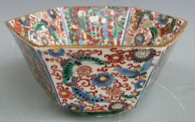 A late 18th/19thC Chinese octagonal pedestal bowl with enamelled figural and botanical decoration