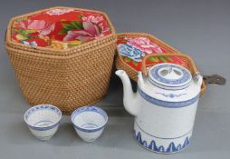 Chinese blue and white tea set in fitted wicker carry case, case 21x25x25cm.  COLLECTING