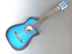 Acoustic guitar in blue lacquered finish, fitted with steel strings, with Stagg gig bag