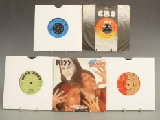 Approximately 50 singles, mostly 1960s and 1970s, in a case