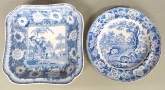 A 19thC blue and white dish decorated with a man riding a zebra (21cm) and a similar plate decorated