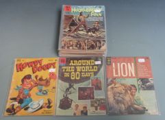 Twenty-five Dell and Gold Key comic books including 12 Walt Disney titles.