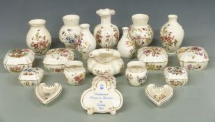 A collection of Zsolnay Pecs porcelain including trinket boxes, dishes, Zsolnay advertising sign,