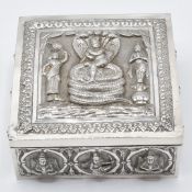 Indian white metal box with embossed deity and coiled cobra snake decoration, 9.8 x 9.8 x 4cm