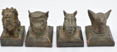 Four bronze seals, 3.8cm