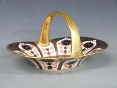 Royal Crown Derby Imari 1128 pattern basket with gilded handle, W28 x D20.5 x H15cm