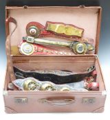 A collection of 19thC heavy horse harnesses and brasses, the leather stained red with heart