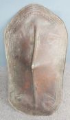 A 19thC leather African tribal shield, probably Kenya/East Africa, W110 x H60cm, formerly the