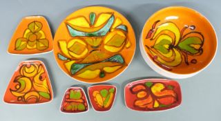 A collection of retro Poole Pottery Delphis ware including a charger and pedestal bowl, largest