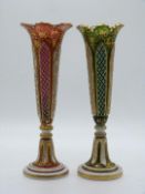 Pair of Victorian overlaid and cut glass vases with gilt decoration and white overlay over green and