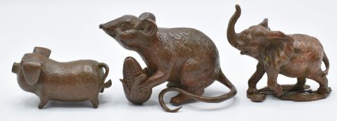 Three Japanese bronzes, an elephant, pig and mouse eating sweetcorn, largest 5 x 5cm