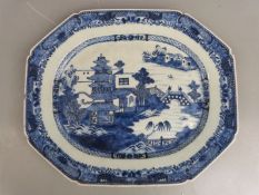 A 19thC Chinese porcelain octagonal charger decorated with pergola, bridge and figures, 38 x 45cm