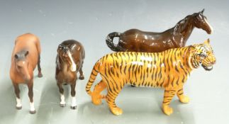 Beswick horses including Welsh Cob, matt racehorse and swish tail and a Beswick tiger