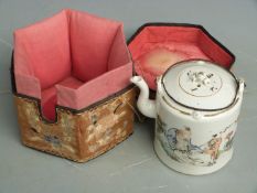 Chinese late 19thC/20thC teapot in ornate silk case with floral decoration, case 14 x 15 x 15cm