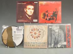 Approximately 160 singles, mostly 1980-2000 including New Order, Wedding Present, Madonna, Guns n