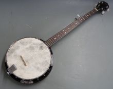 Countryman banjo with Remo head, in padded hard case