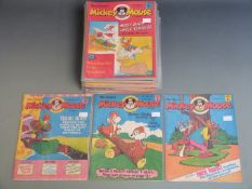 Sixty-six issues of Walt Disney's Micky Mouse comic books/ magazines from issue 2 (1975) to issue