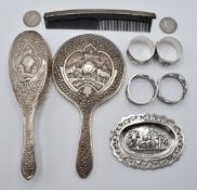 Indian or similar white metal mirror and hand brush, both stamped silver, small white metal oval