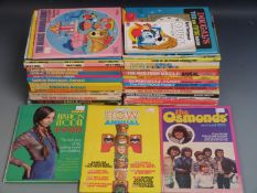 Thirty-eight TV related books and annuals including Man From UNCLE, Magic Roundabout, TV