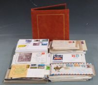 A quantity of loose GB first day covers including early QEII and a Benham album