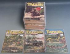 Seventy Tarzan Adventures comic books.