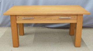 Contemporary light oak low coffee table with drawer, W102 x D50 x H47cm